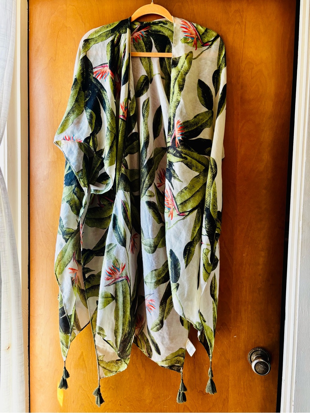 Do everything in love Tropical Leaf Throw in Green and White with Tassels